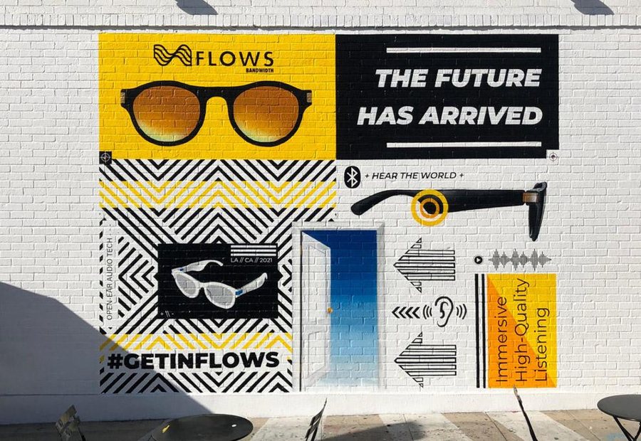 FLOWS brand mural reading The Future Has Arrived